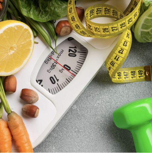 Scale with measuring tape and fresh produce